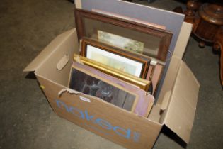 A box of various of pictures and prints to include