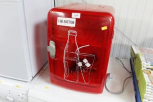 A Coca-Cola mini fridge