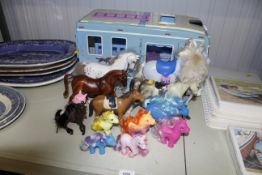 A Breyer toy horse box, various toy horses and My