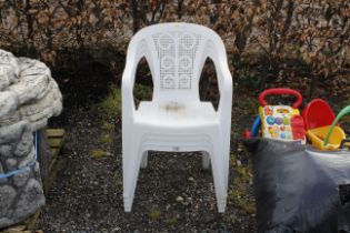 Four plastic garden chairs