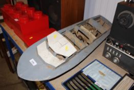 A model boat hull and engine