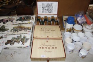 Three boxes of Mercier Champagne bottles and adver