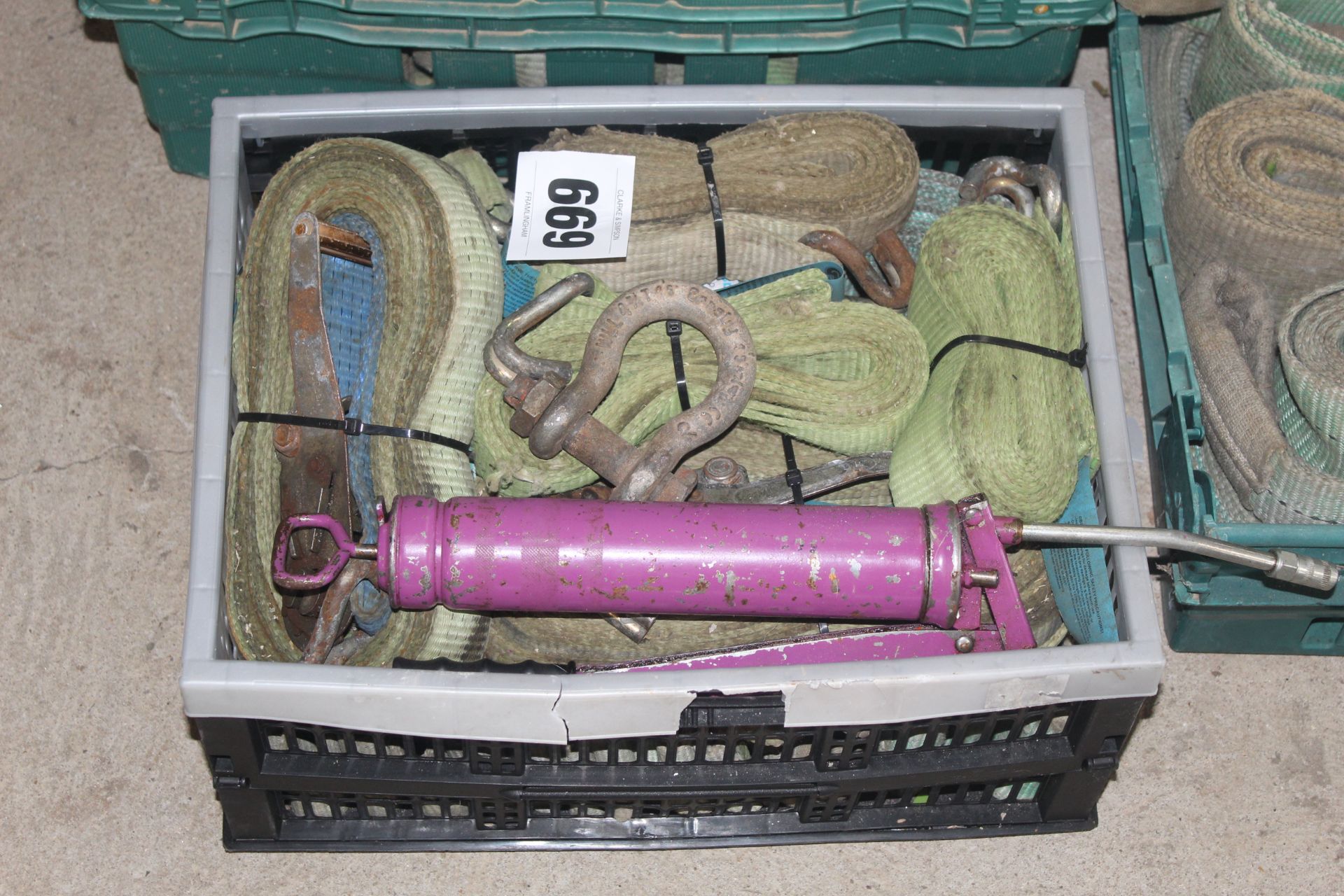 Quantity of ratchet straps, shackle and grease gun