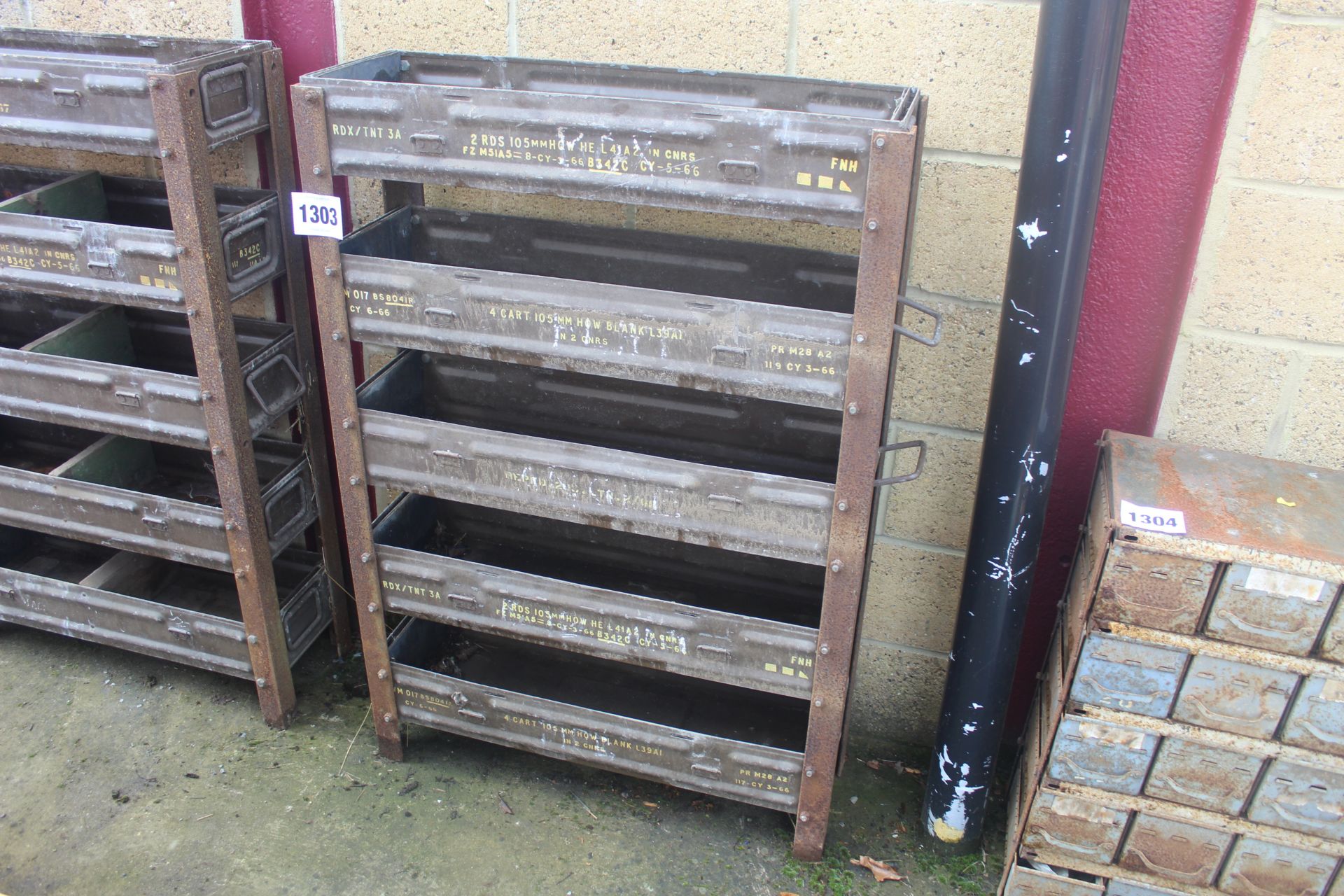 Workshop storage unit made from ammunition boxes.