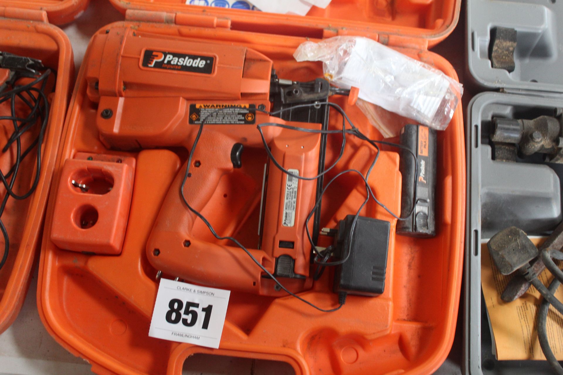 Paslode nail gun. With battery and charger.