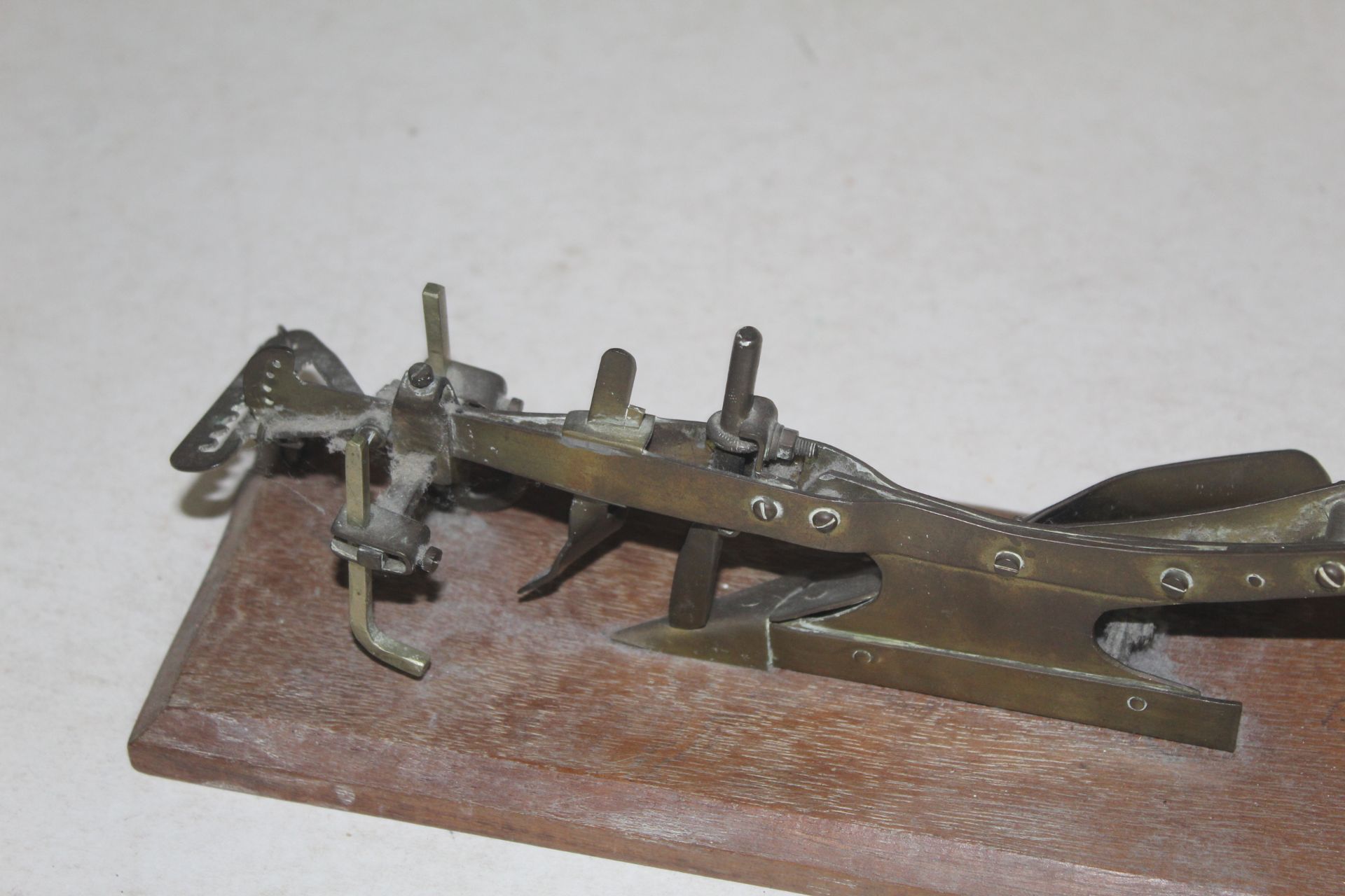 Model of a horse plough on a plinth. - Image 5 of 5