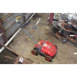 Mountfield lawn scarifier.