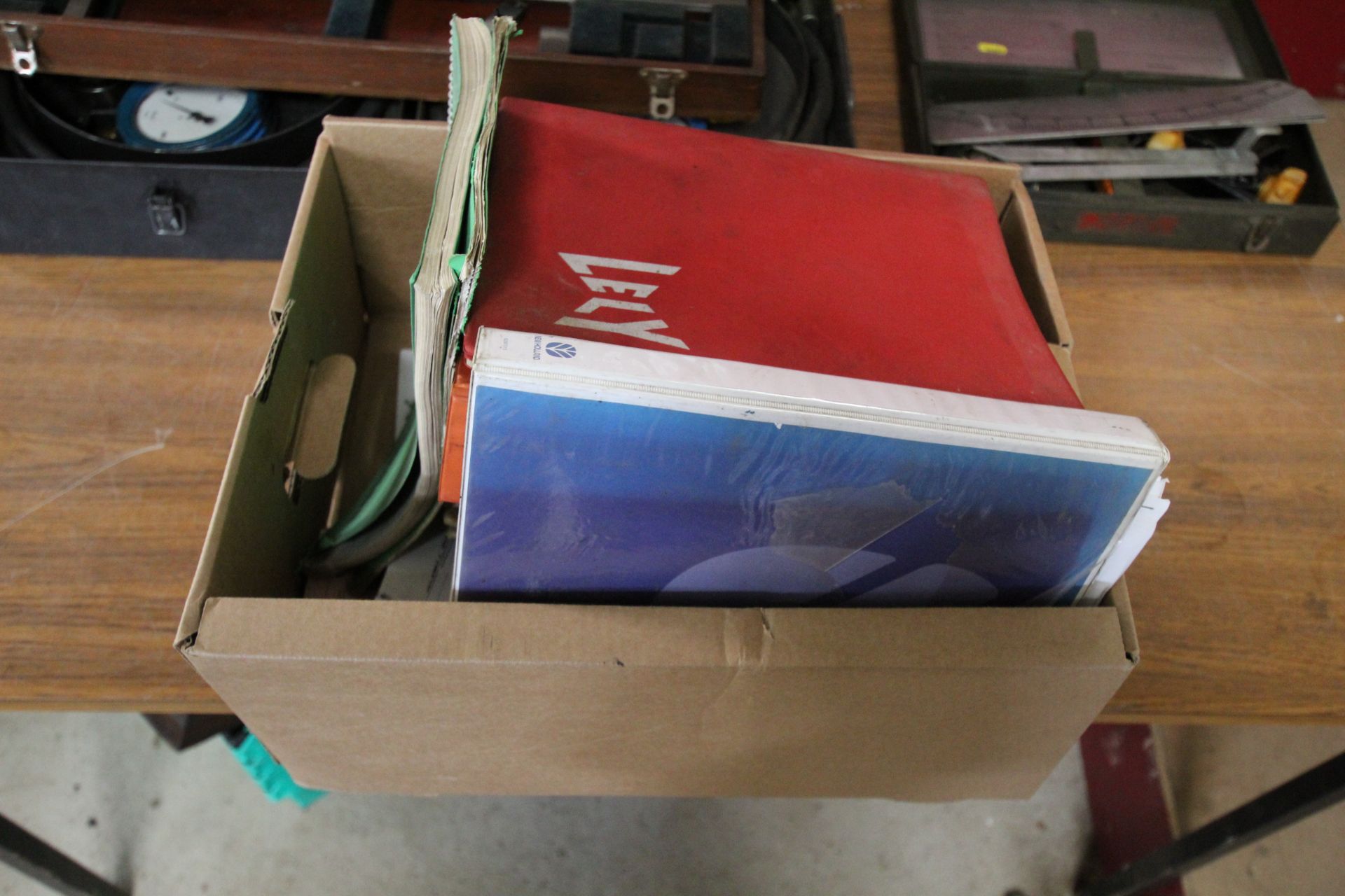 Box of Misc Manuals.