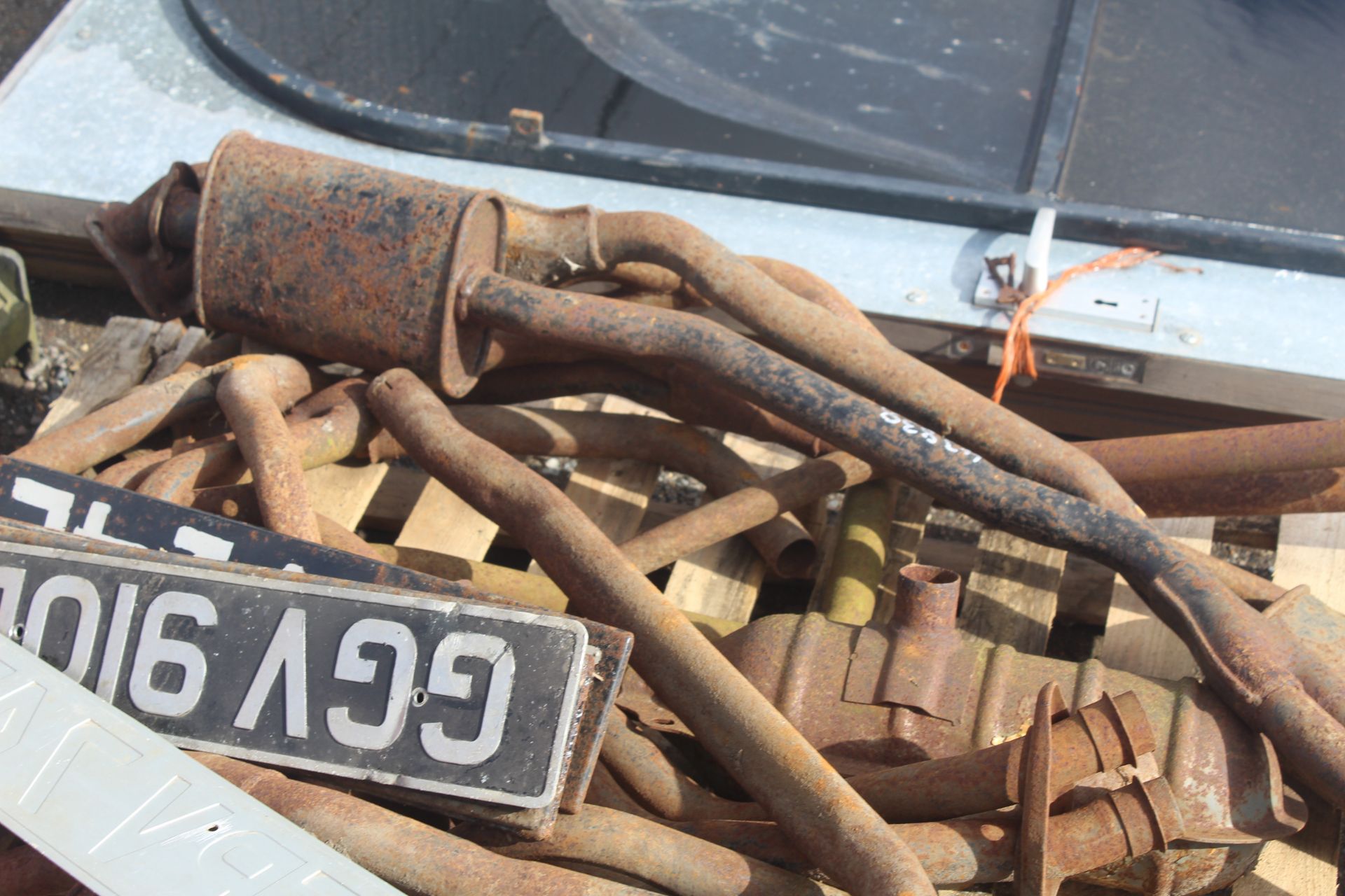 Various car exhausts and vintage number plates. V - Image 3 of 3
