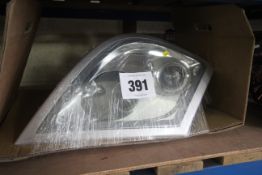 Unused DAF HGV Hella headlight. For sale on behalf of the Liquidators. V