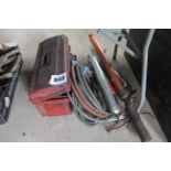 Hydraulic testing gauges, flame wand, welding gun and pipes and air assisted grease gun.