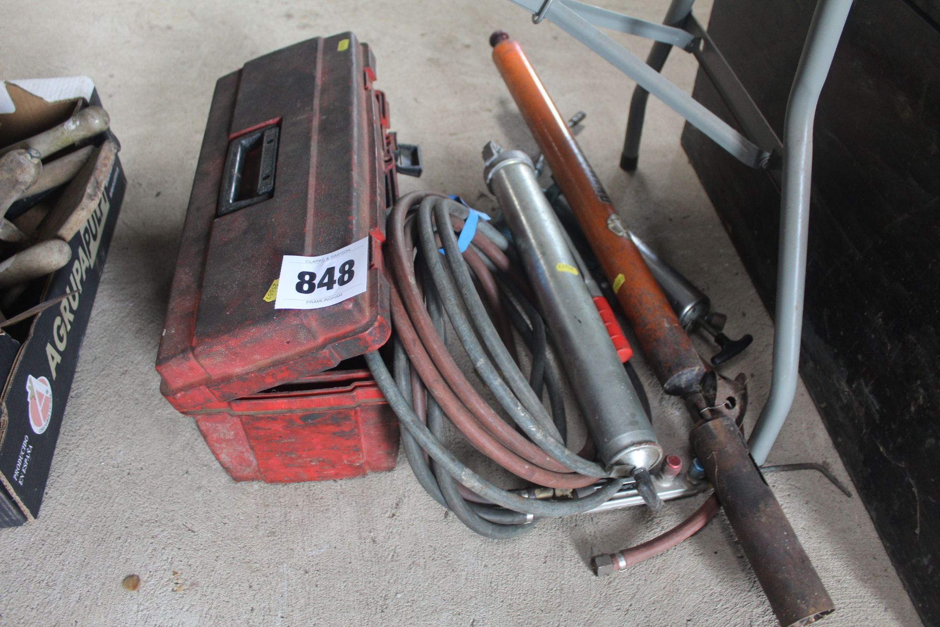 Hydraulic testing gauges, flame wand, welding gun and pipes and air assisted grease gun.