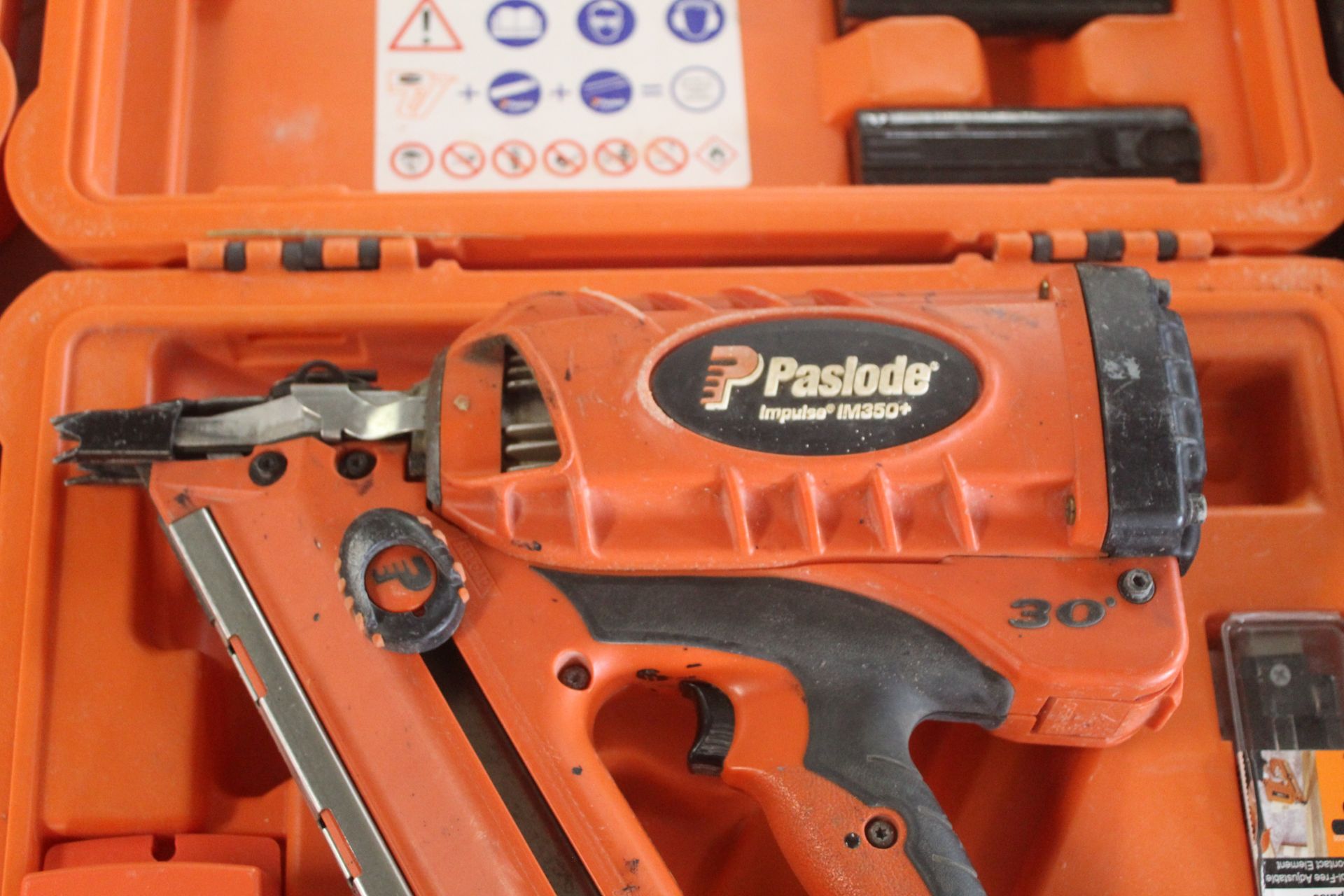 Paslode Impulse IM350 nail gun. With 2x batteries - Image 5 of 8