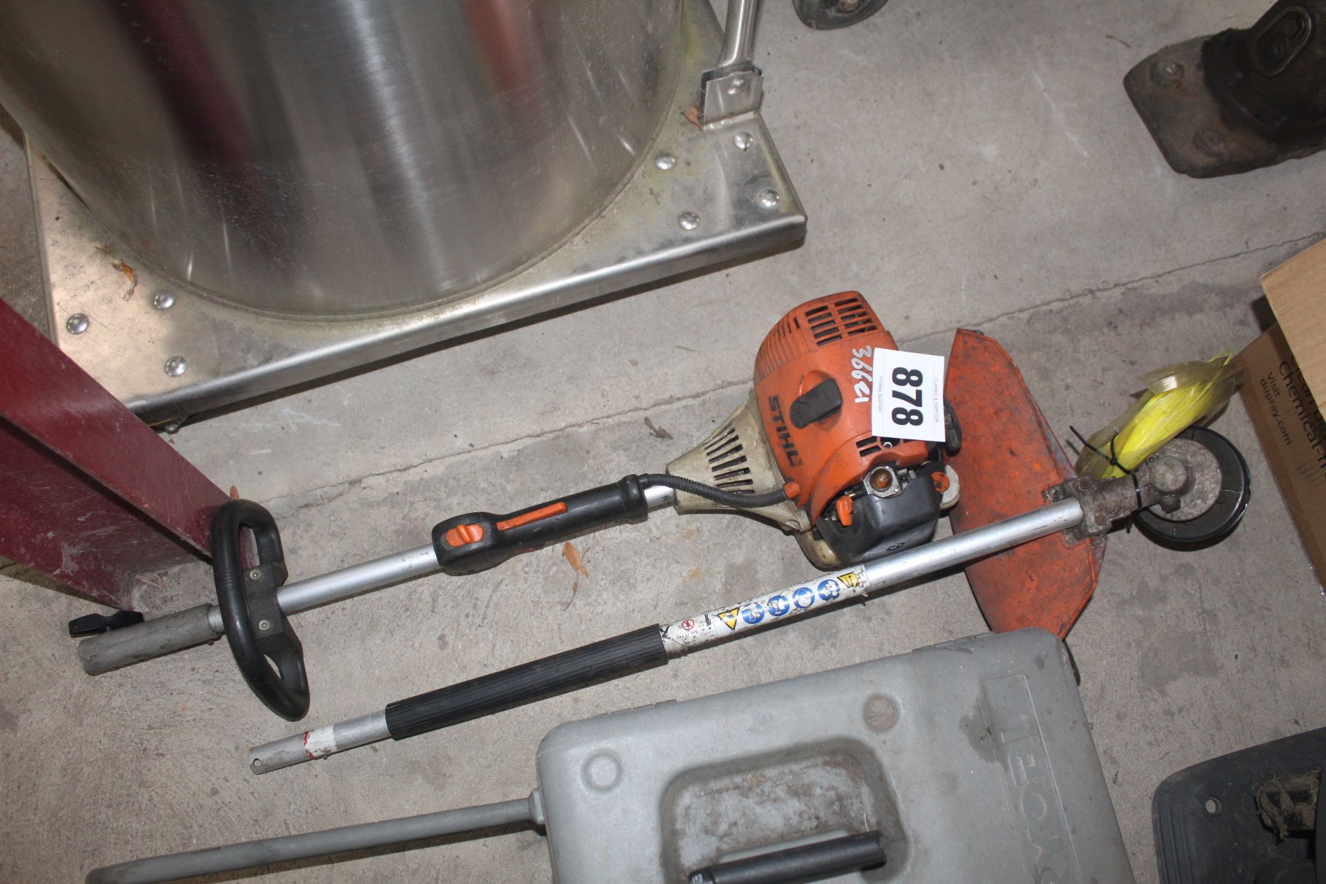 Stihl split shaft with strimmer attachment.