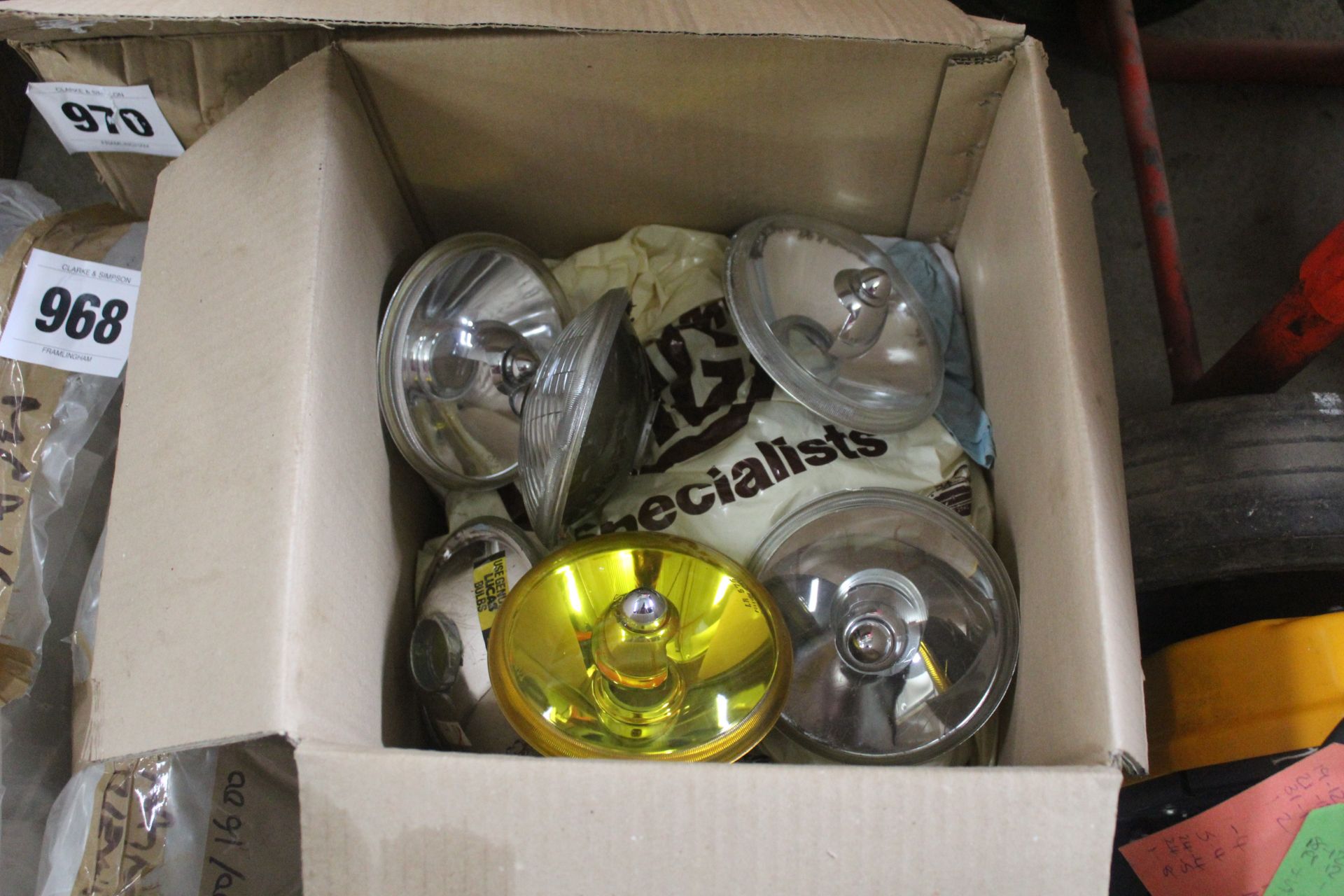 Box of MGB lamps and parts.