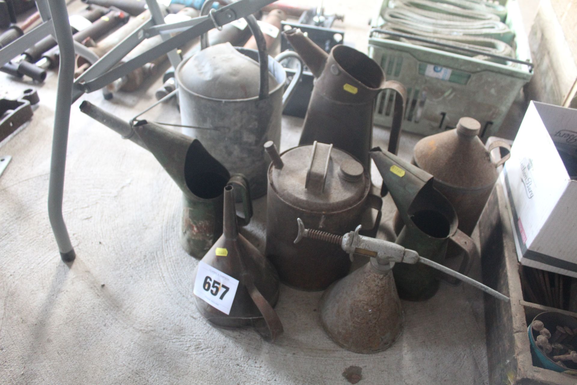 Various oil jugs etc.