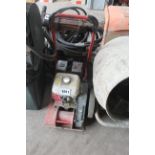 Honda powered wacker plate. V