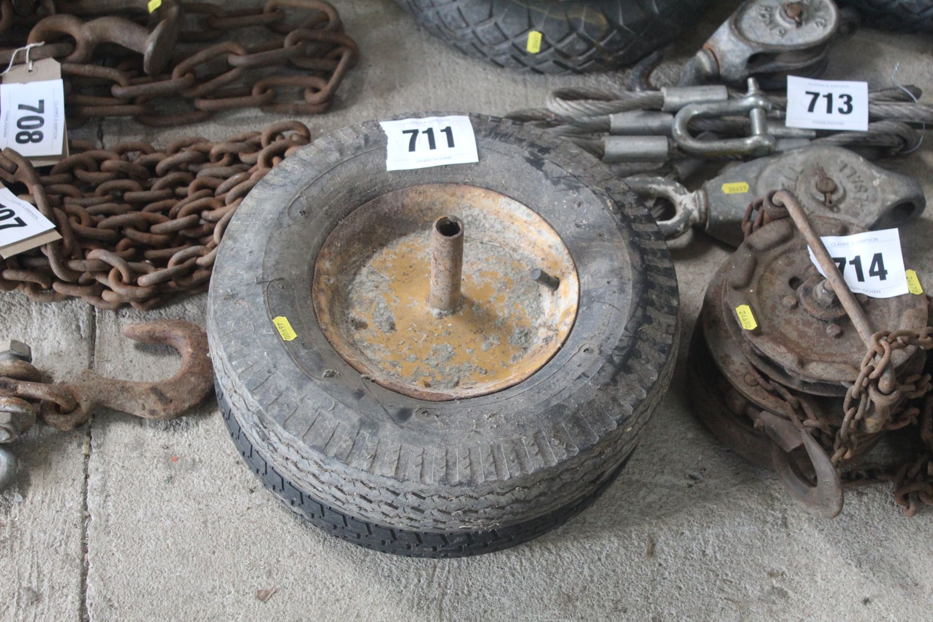 Wheel barrow wheel and another tyre.