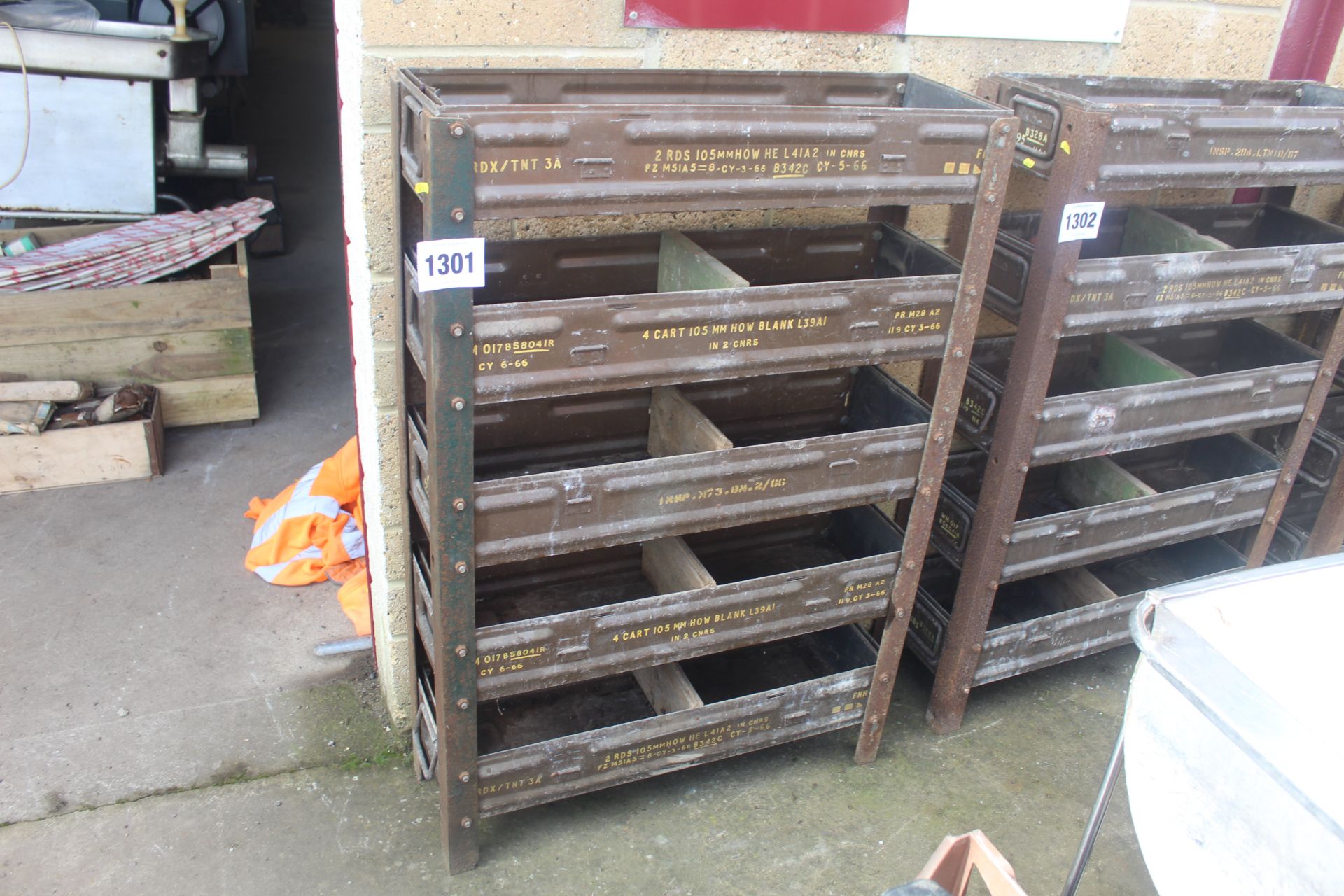Workshop storage unit made from ammunition boxes.