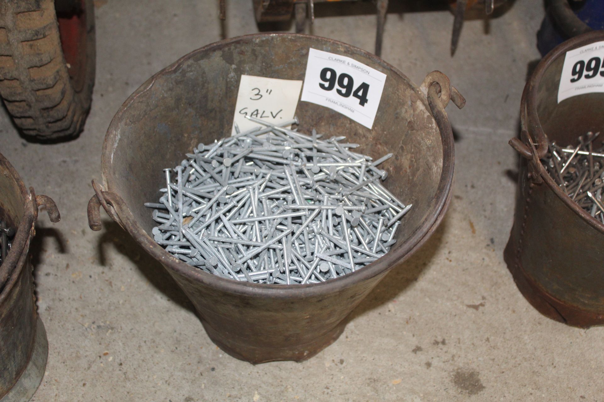 Bucket of 3in galvanised nails.
