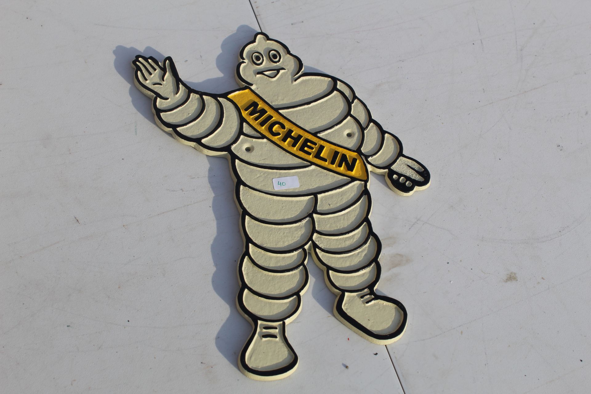 Michelin shaped plaque. V