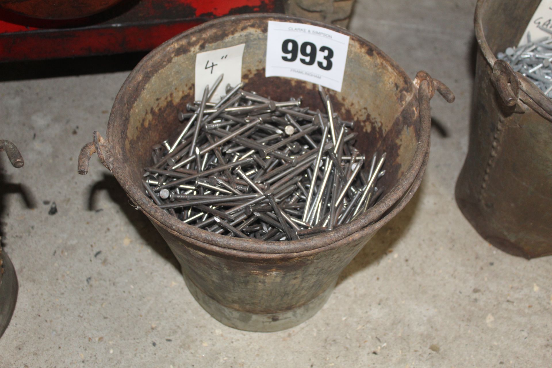 Bucket of 4in nails.