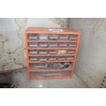 Small drawer unit with contents of various vehicle