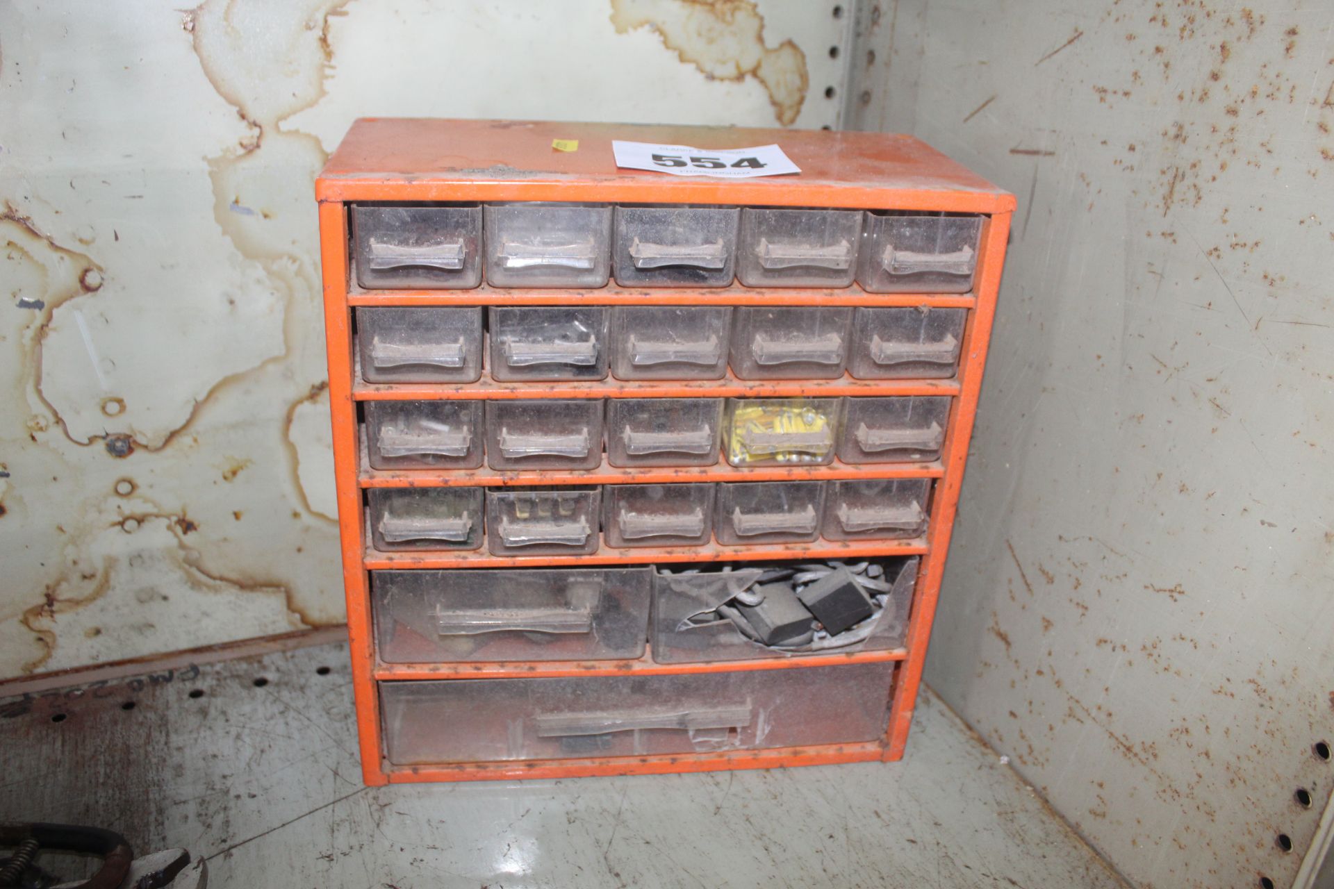 Small drawer unit with contents of various vehicle