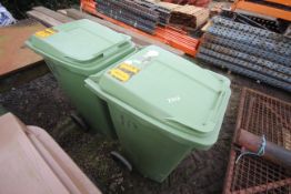 2x green wheelie bins.