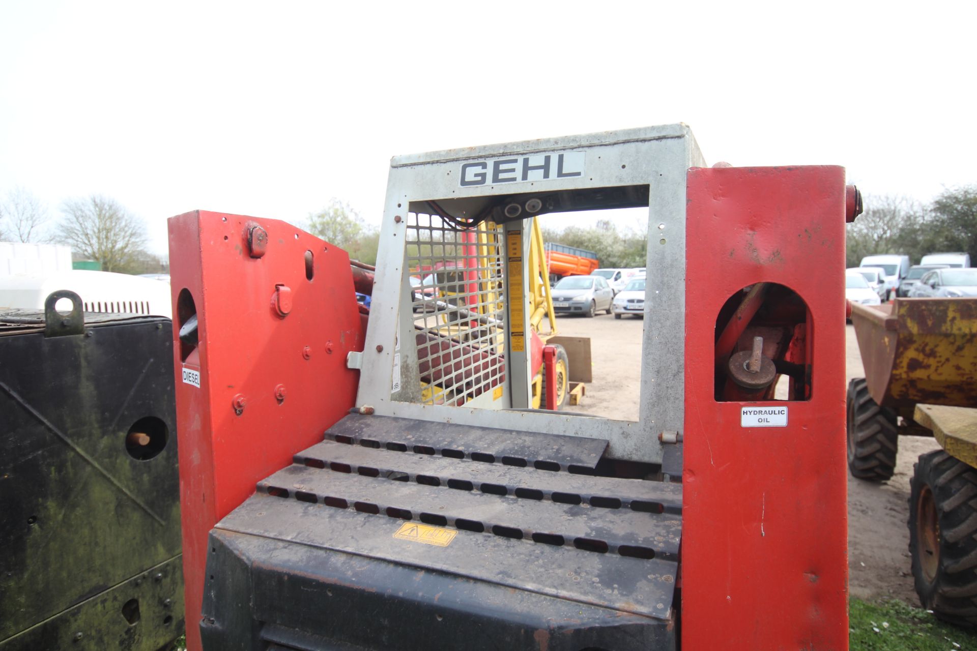 Gehl 3610 skid steer loader. With pallet tines and bucket. Key held. - Image 14 of 35