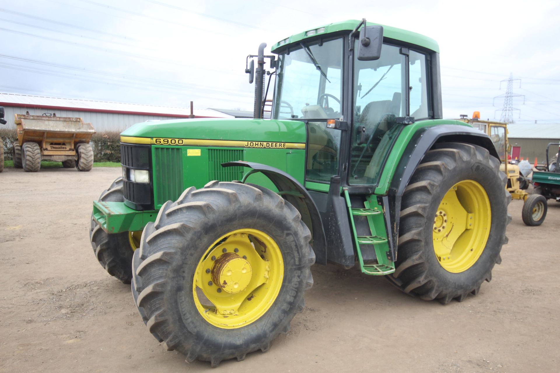 John Deere 6900 4WD tractor. Registration R952 LEL. Date of first registration 01/08/1997. 11,230