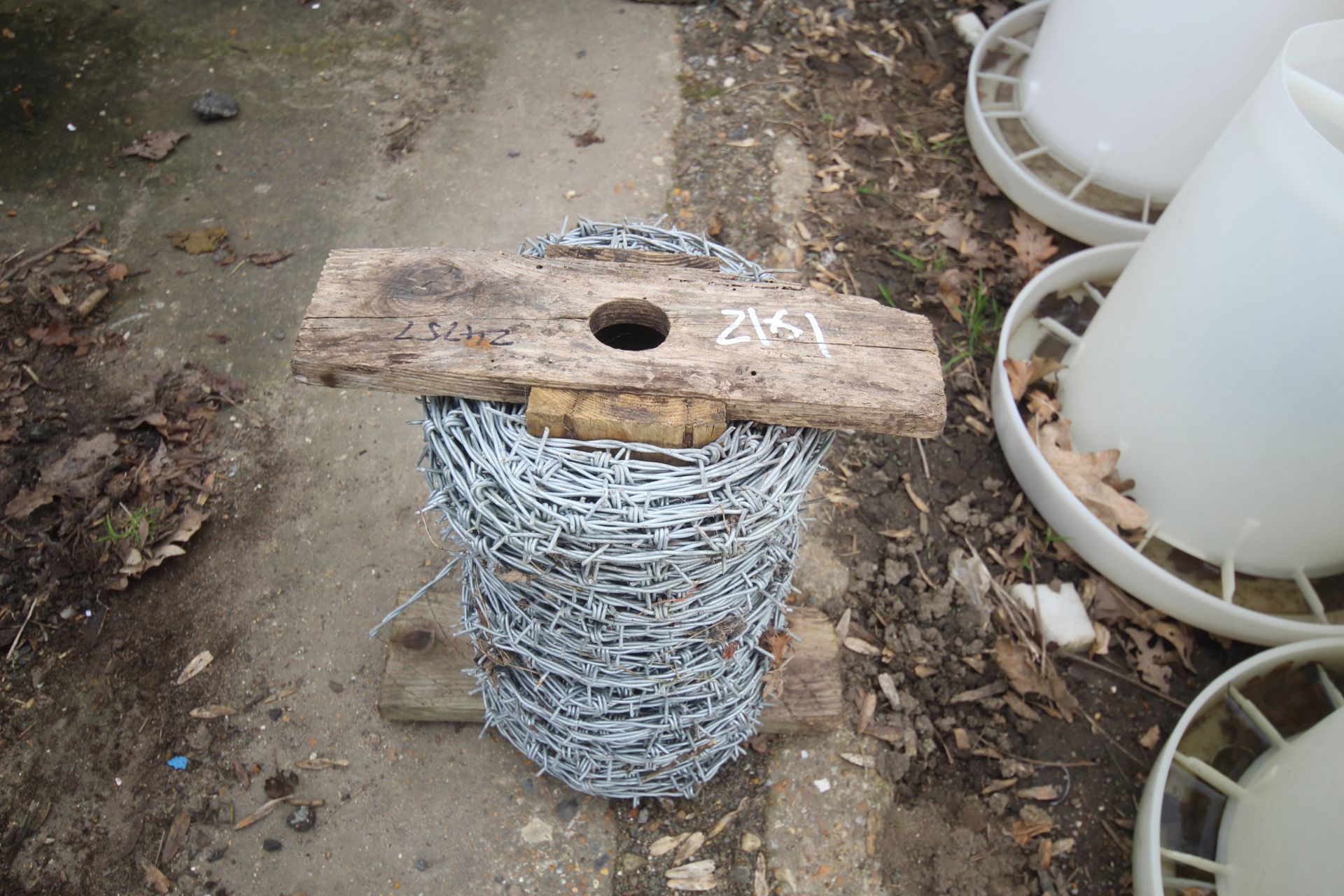 Part roll of barbed wire.