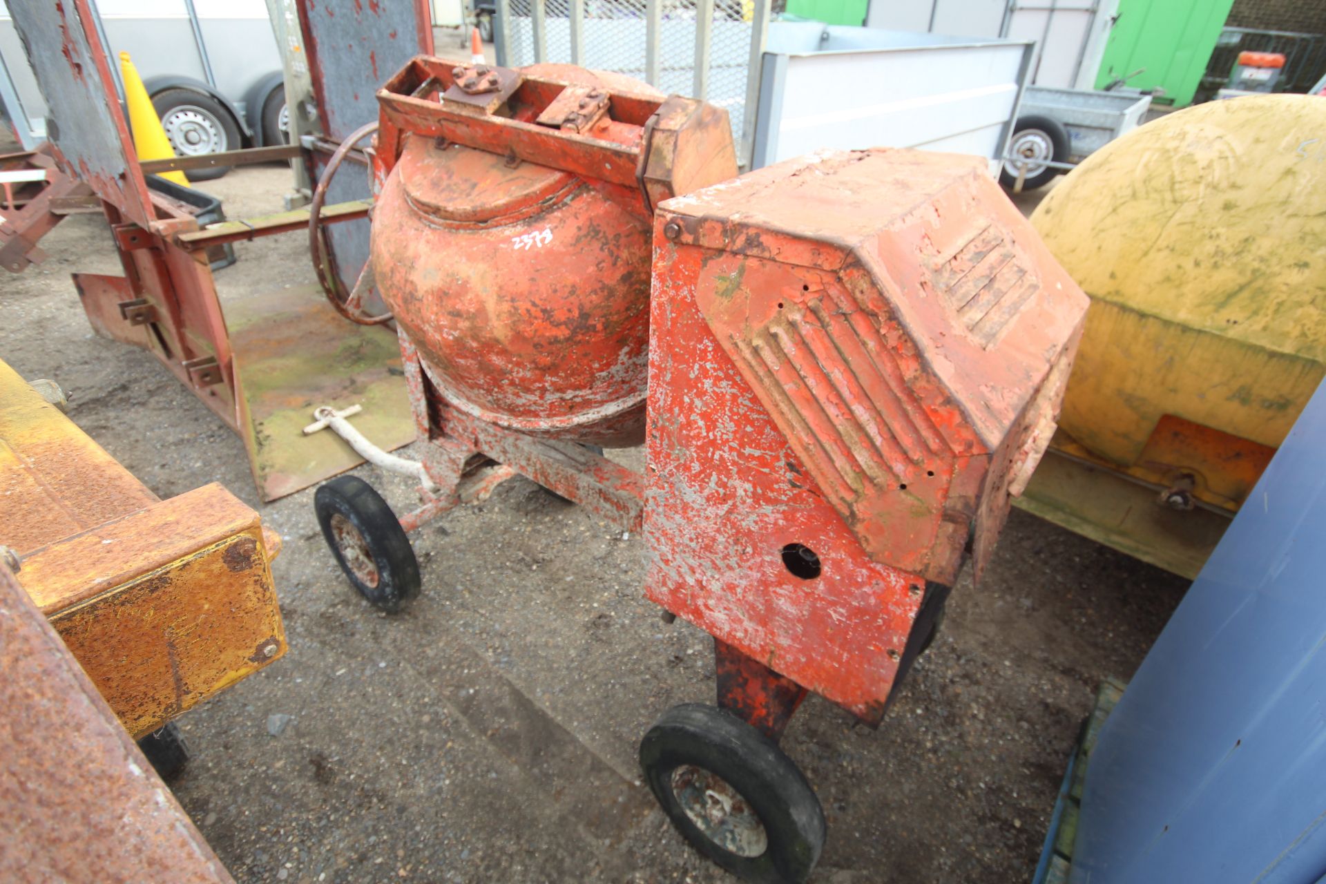 Large diesel site cement mixer.