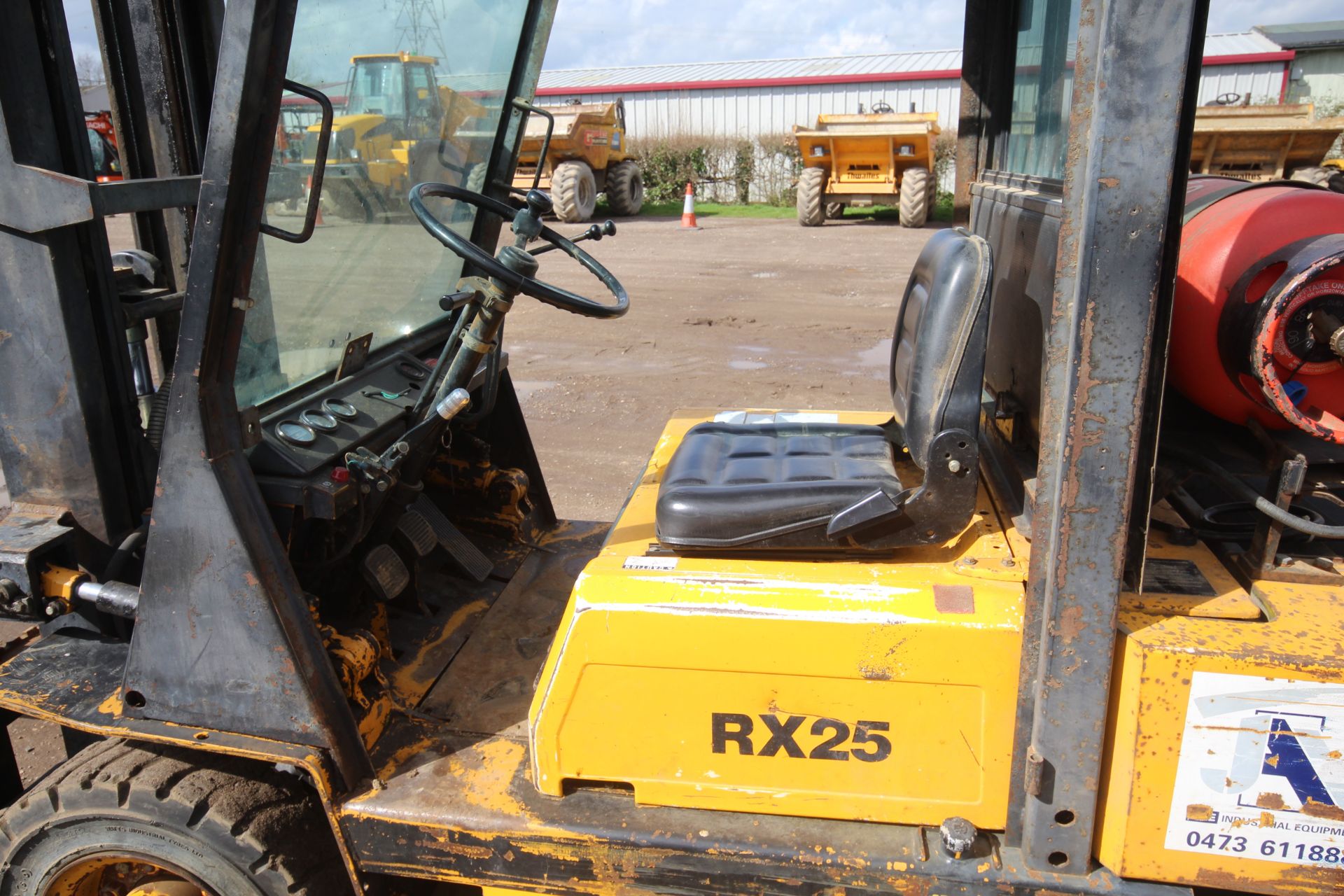 Lancer Boss RX25L 2.5T gas yard forklift. 7,027 hours. With Nissan engine and triplex mast. Key - Image 28 of 53