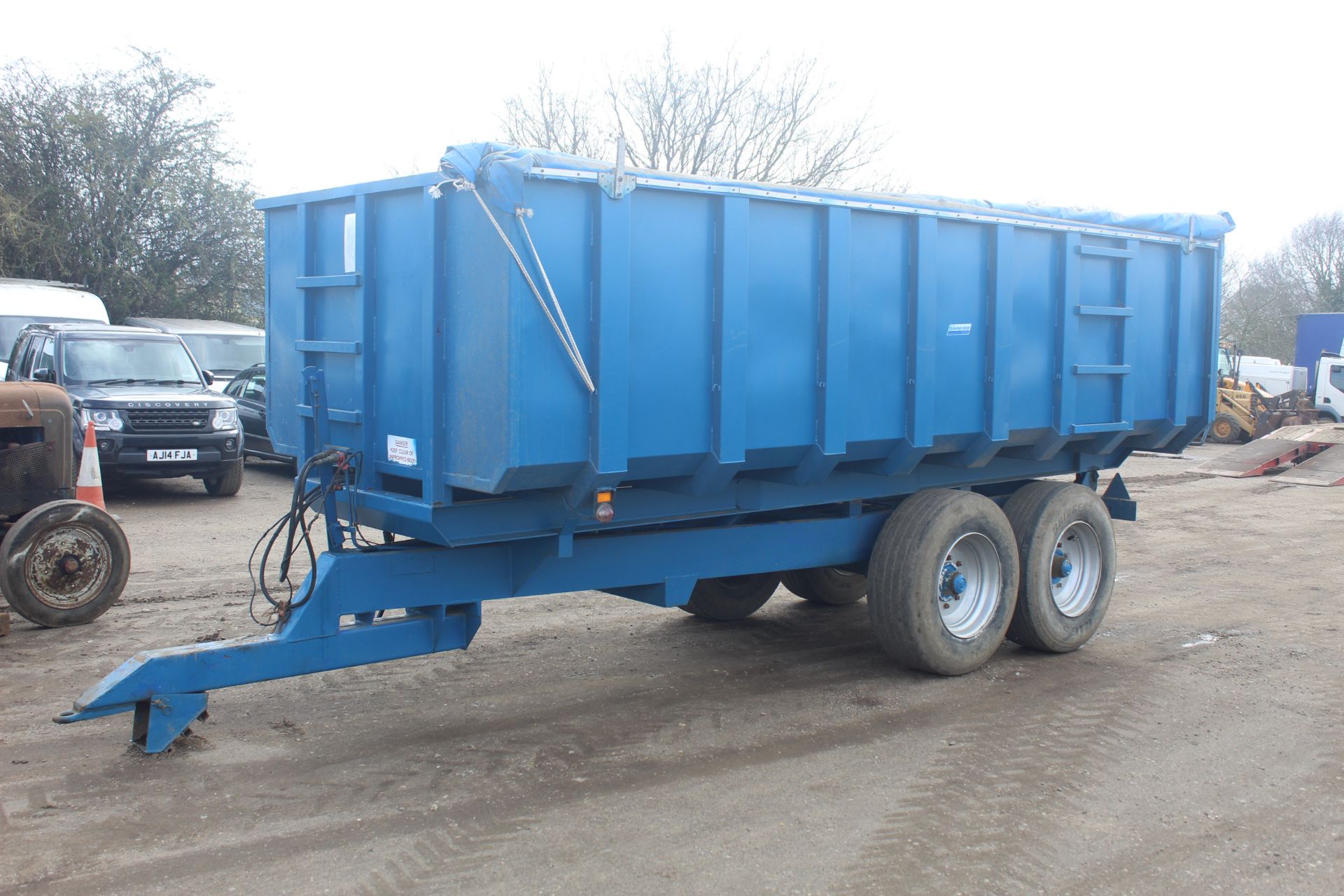 AS Marston 12T twin axle tipping trailer. With super single wheels and tyres and roll over sheet.