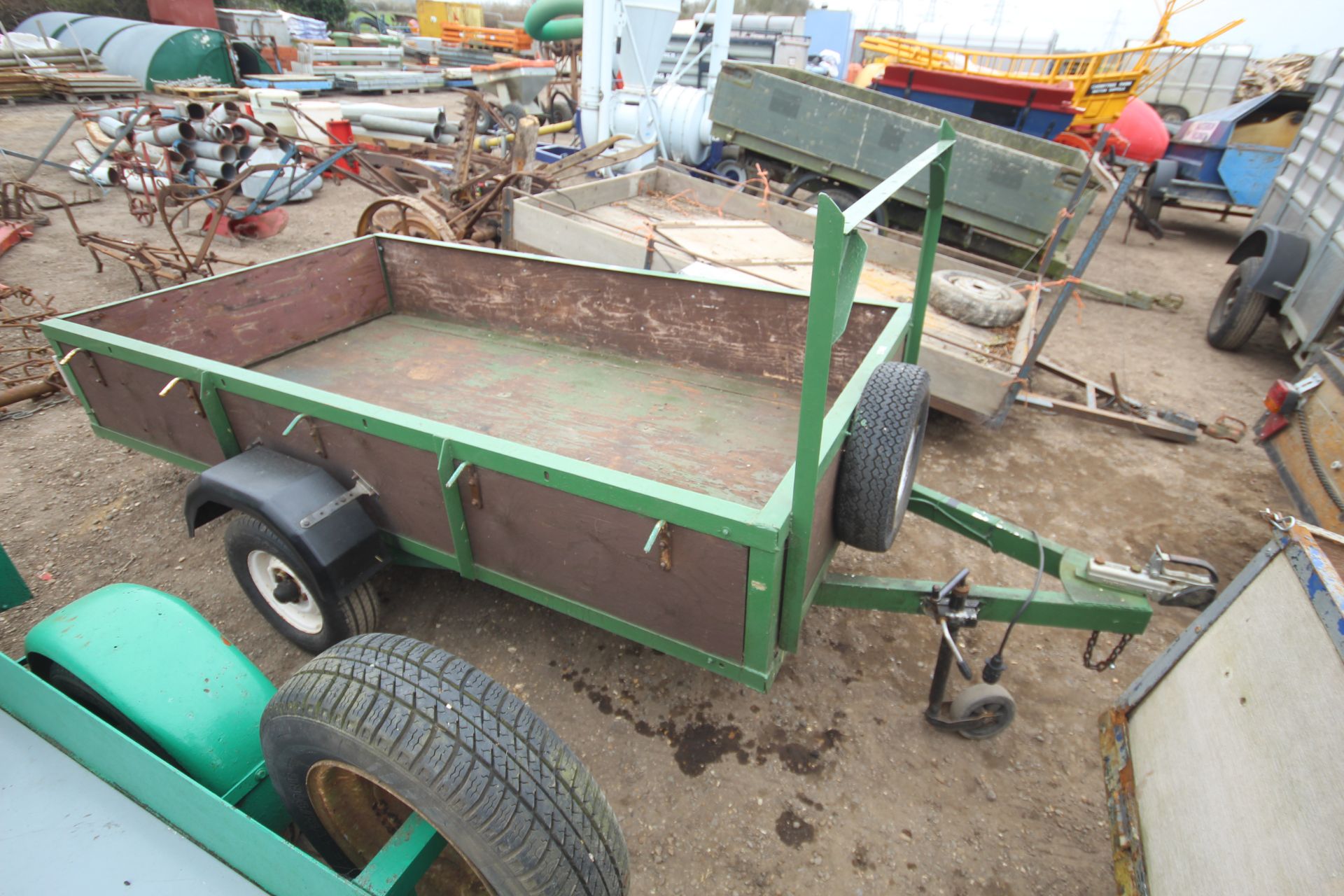 8ft x 4ft single axle car trailer. With ladder rack, lights and spare wheel. Key held.