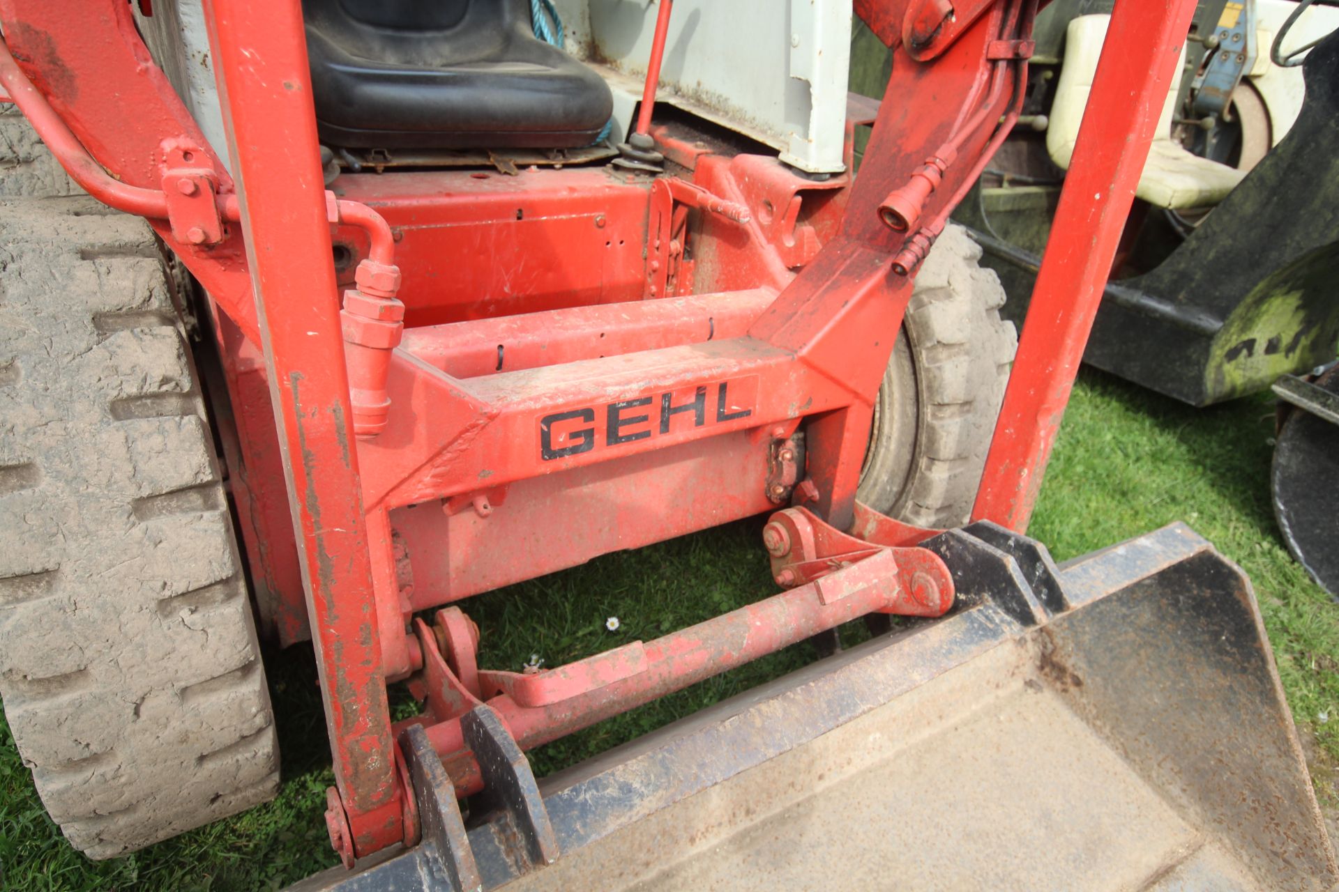 Gehl 3610 skid steer loader. With pallet tines and bucket. Key held. - Image 6 of 35