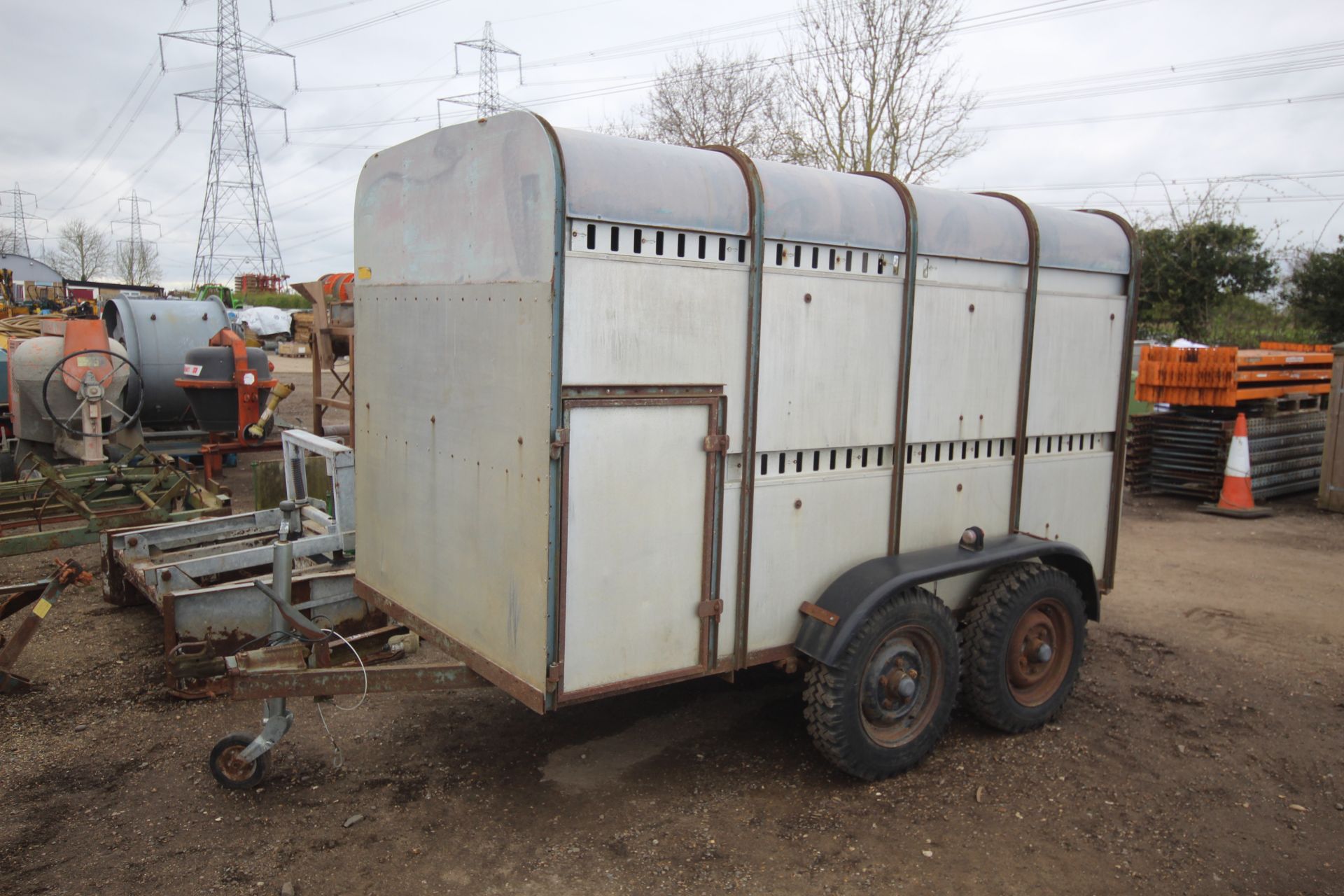 Twin axle livestock trailer.