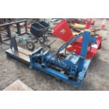 Linkage mounted heavy duty hydraulic log splitter.