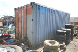 20ft shipping container. Previously used as workshop. With bench and storage racks.