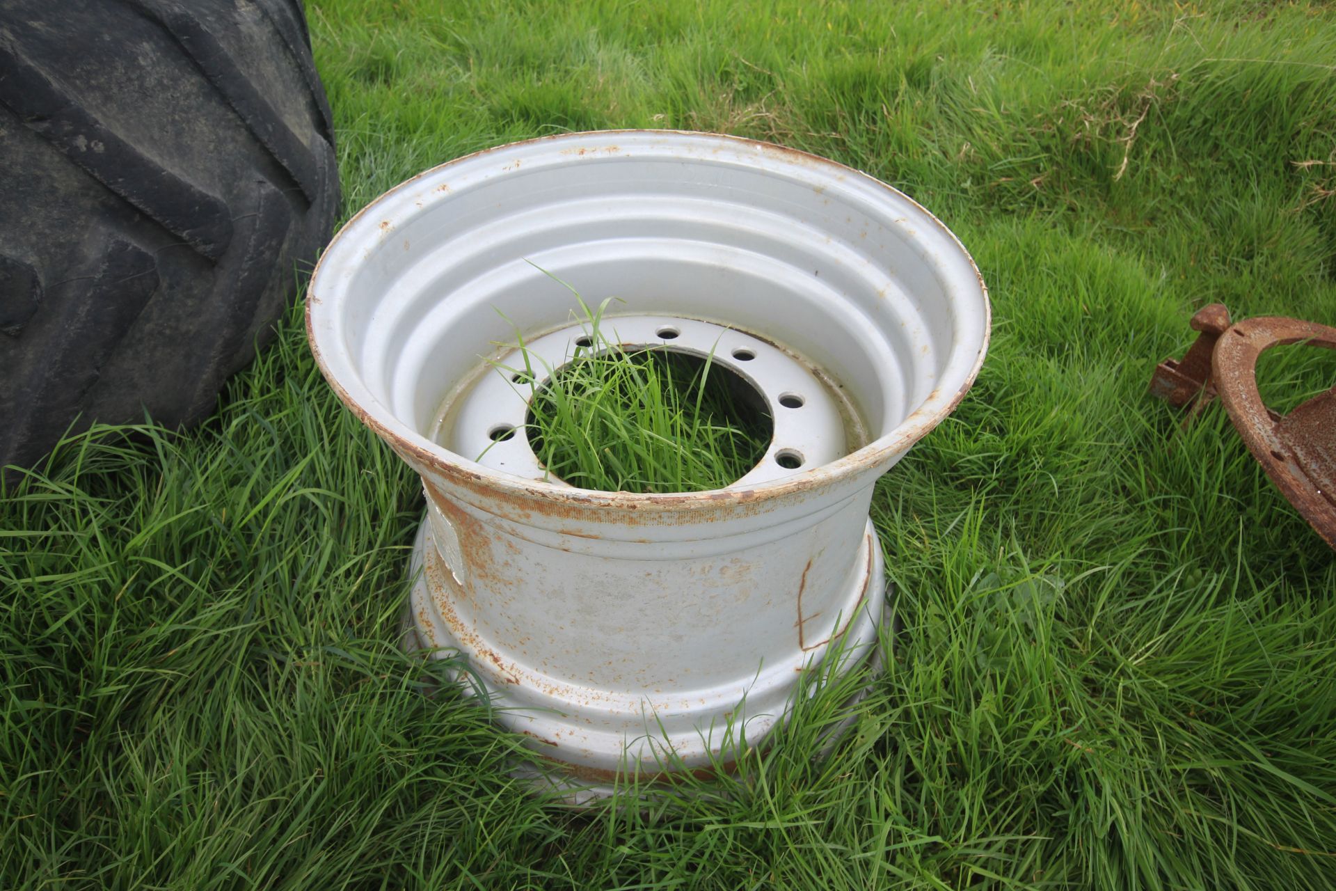 8x24 10-stud muck spreader wheel. V