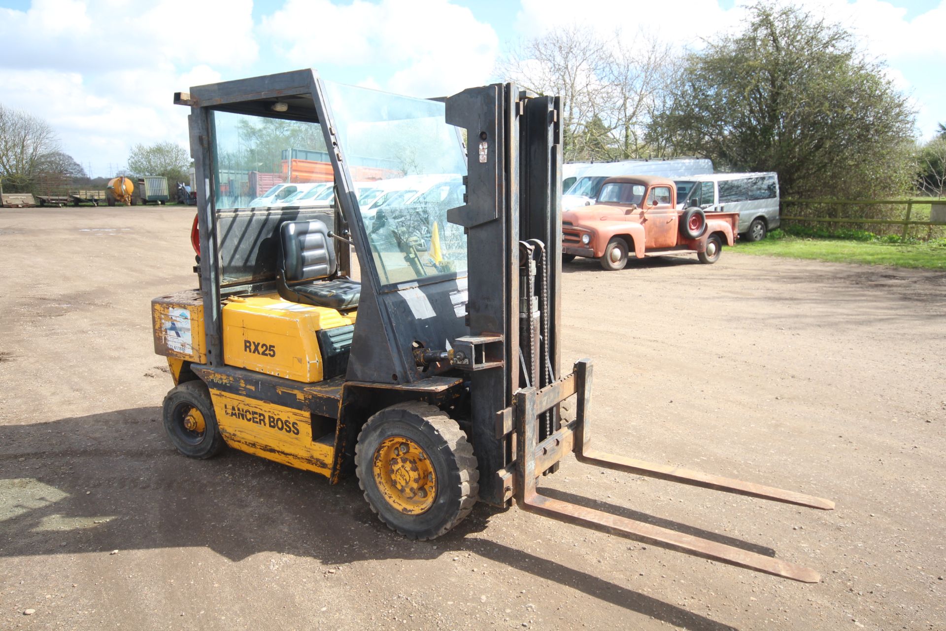 Lancer Boss RX25L 2.5T gas yard forklift. 7,027 hours. With Nissan engine and triplex mast. Key - Image 4 of 53