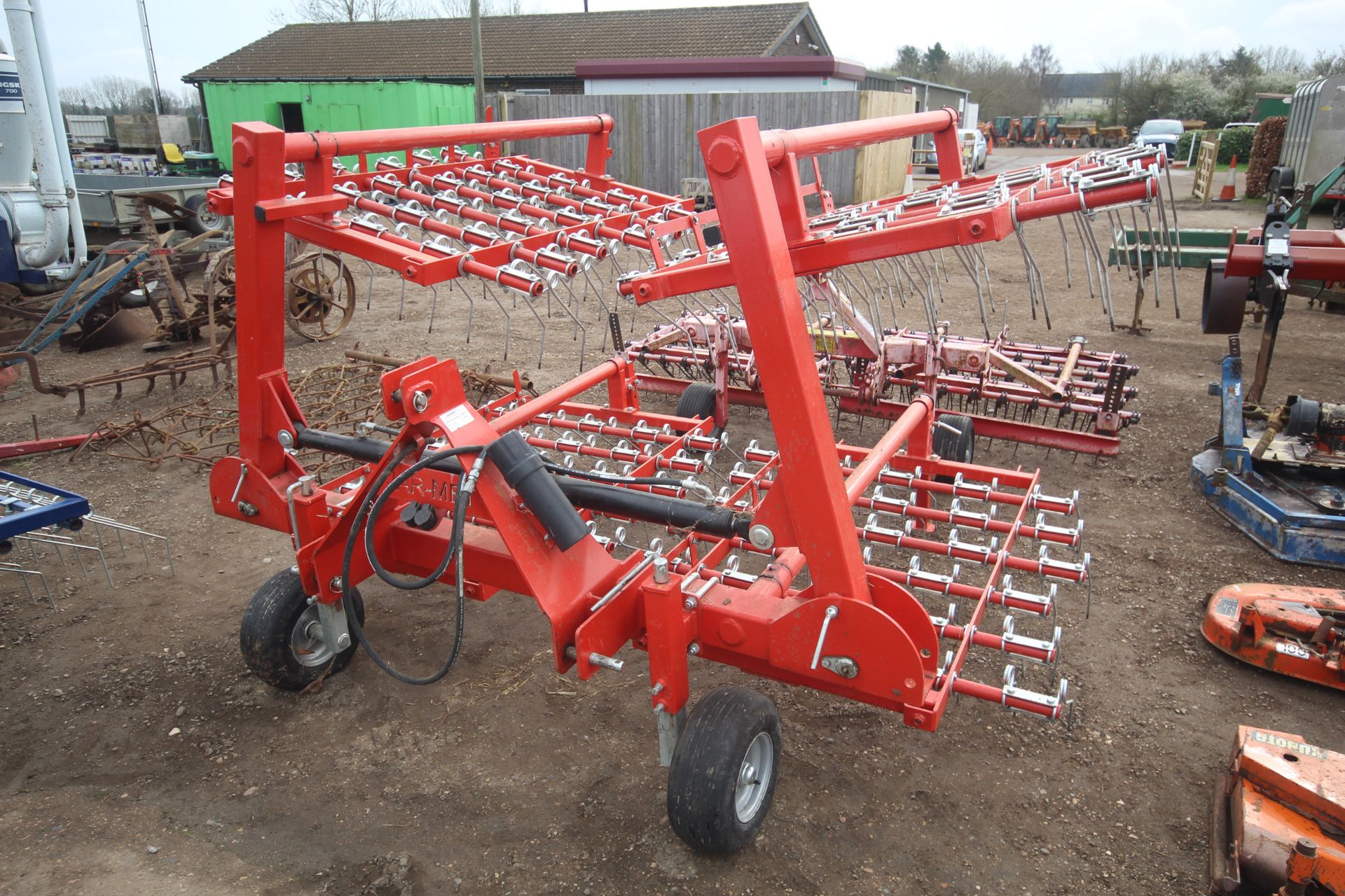 Jarmet 6m hydraulic folding grass harrow.