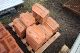 Pallet of roofing tiles.