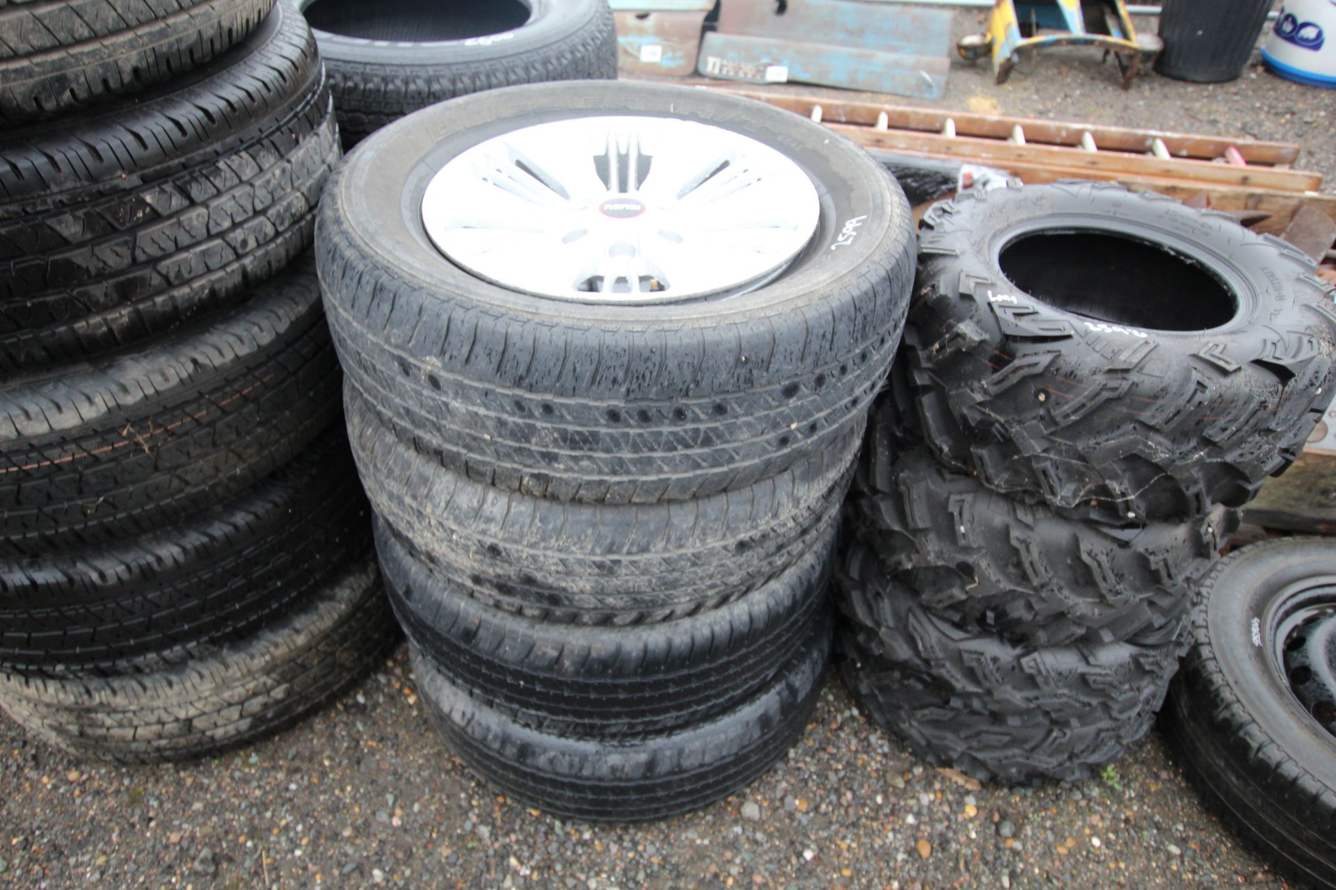 Set of four Isuzu wheels and tyres. V