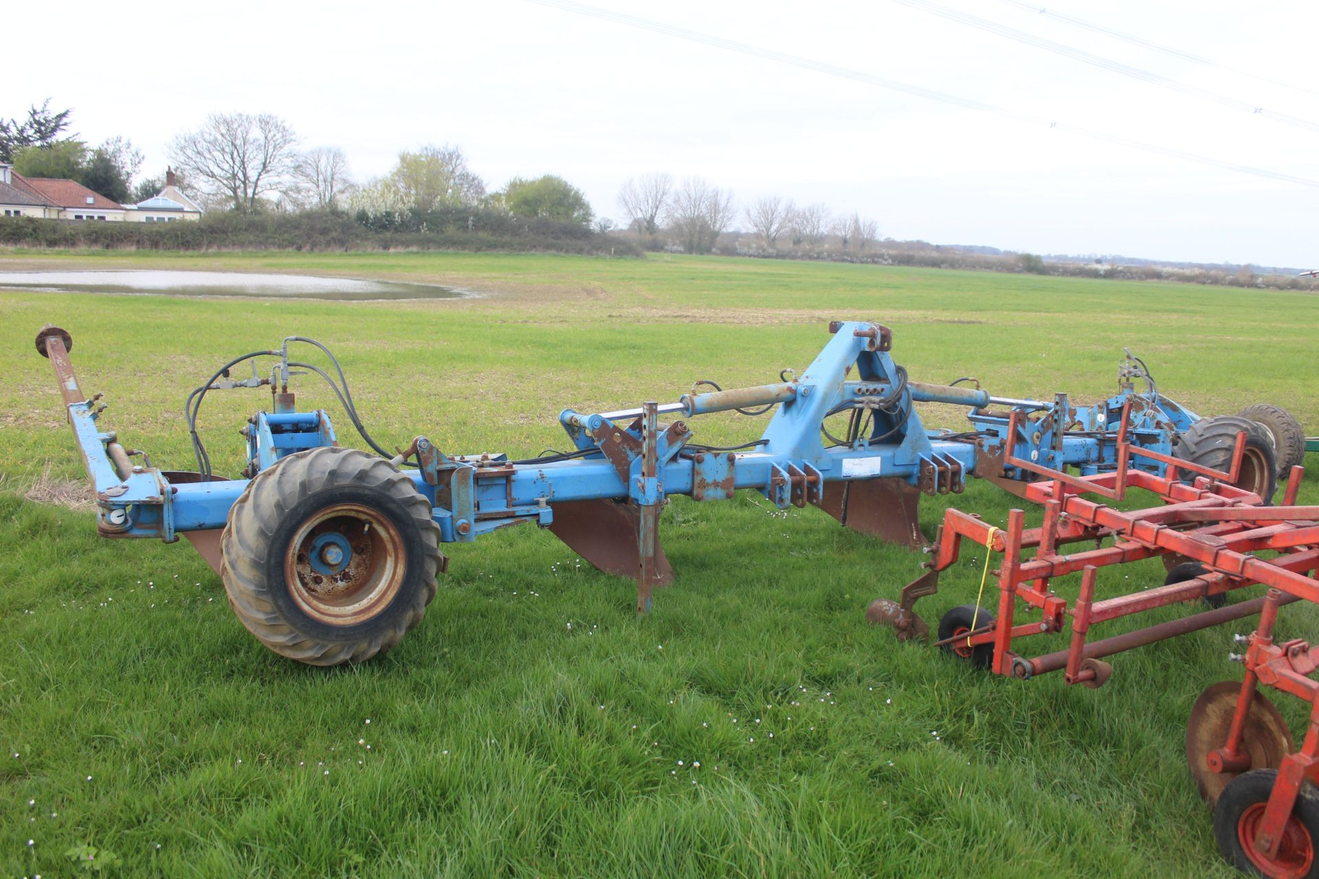 Standen hydraulic folding four row bed former. Serial number 298. 2011. With bout marker brackets