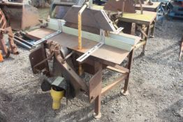 Dening linkage mounted PTO driven saw bench. V
