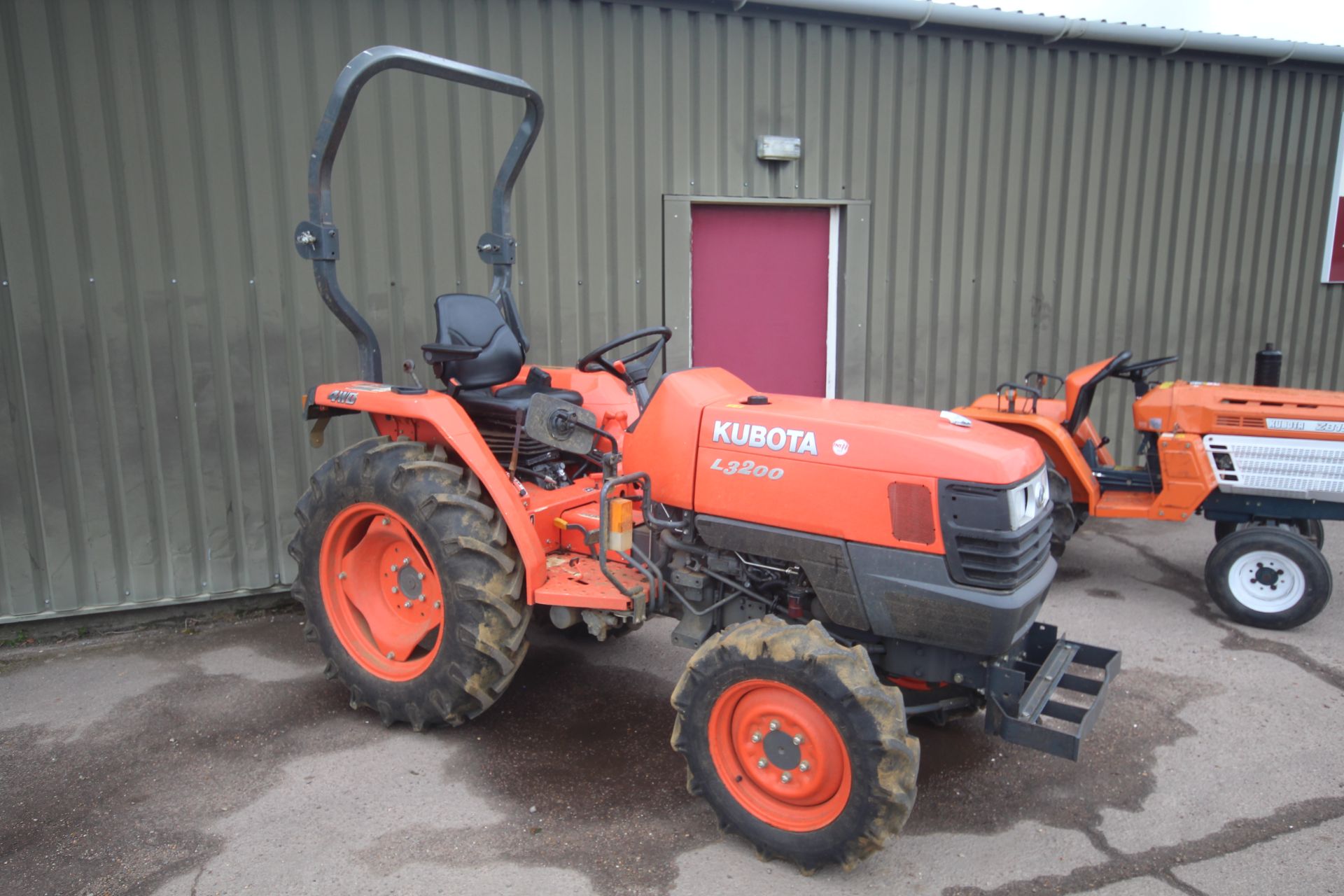 Kubota L3200 4WD compact tractor. Registration AY15 CYZ. Date of first registration xx/xx/2015.