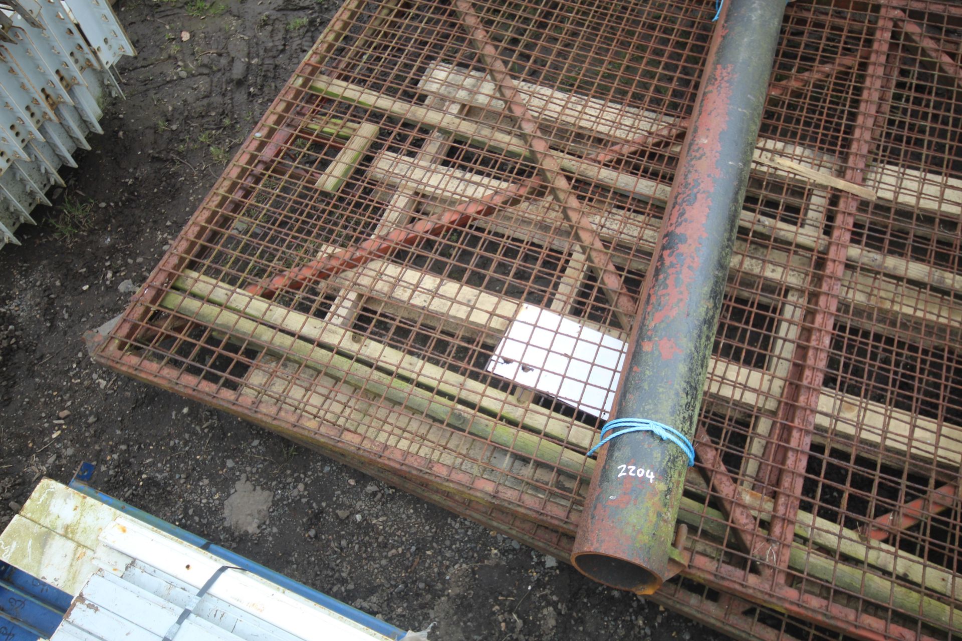 Pair of metal/ mesh gates. Approximately 3m x 1.8m. With posts (cut at ground level). - Image 2 of 5