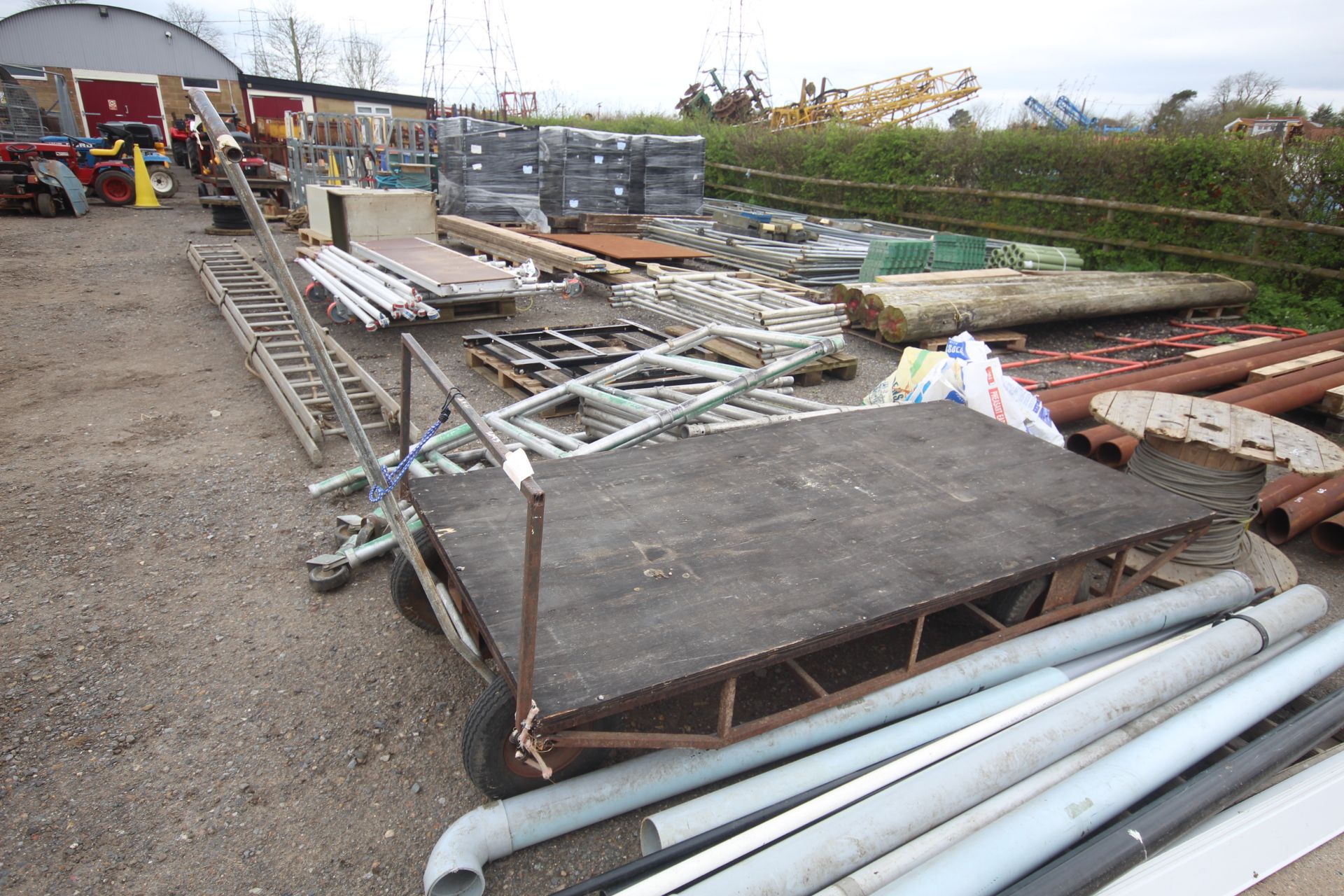 Four wheel yard trolley.